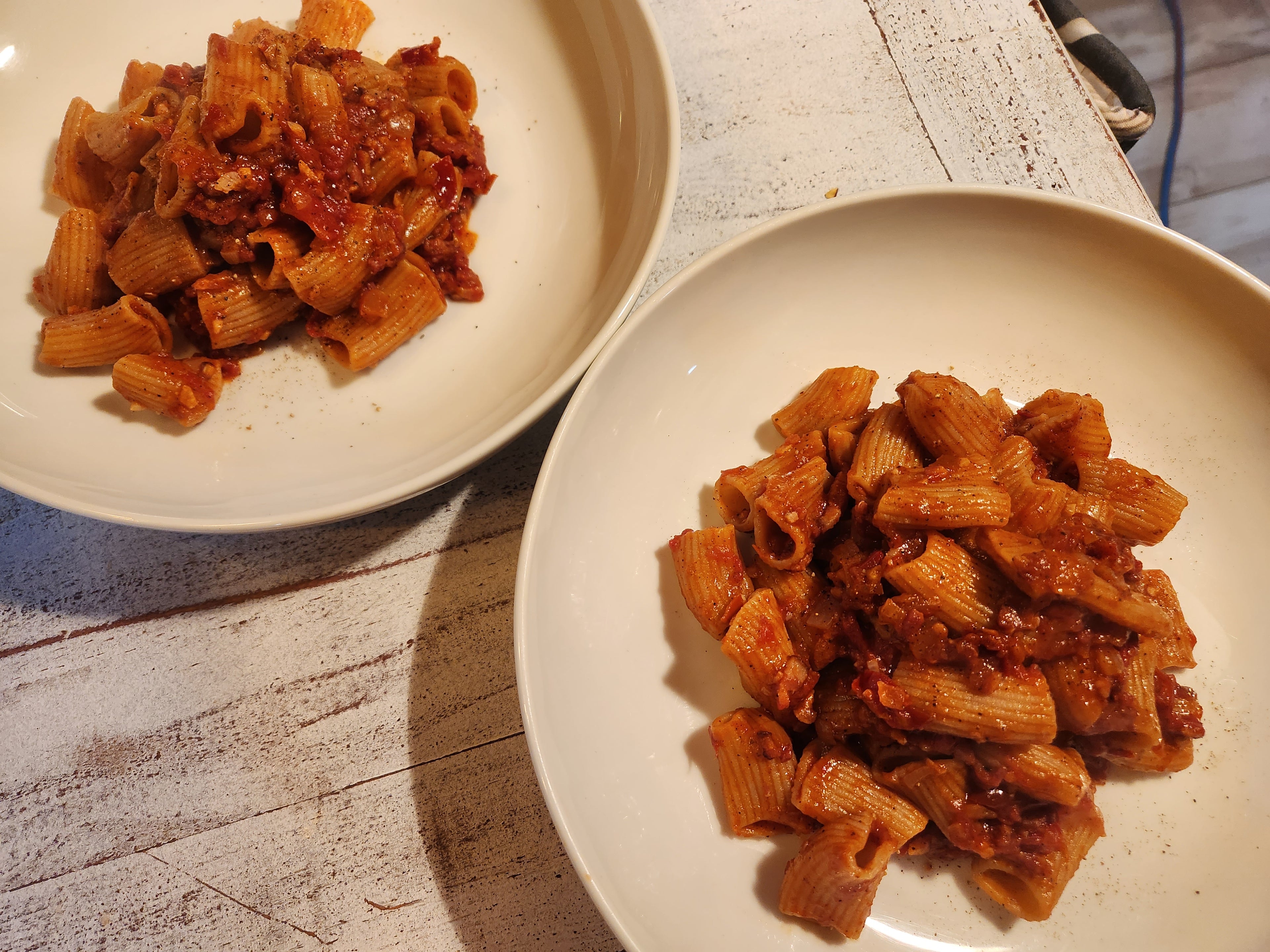 Rigatoni all'Amatriciana recipe photo. fresh pasta in southern italian tomato sauce